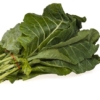 A bunch of green leafy vegetables on top of each other.